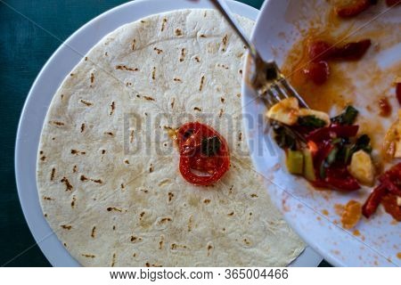 Cooking Pita Rolls Stuffed With Vegetables. Stuffing For Tacos. Eastern Cuisine. Pita Bread In A Pan