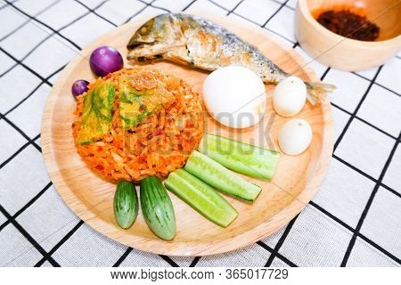 Fried Rice With Prik Pao (chilli Paste With Soya Bean Oil), Omelet With Cha Om, Boiled Chicken Egg, 