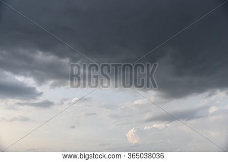 Rain Clouds Background. Clouds Become Dark Gray Like A Big Smoke Before Rainfall. Concept The Rainy 