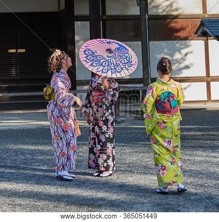 Kyoto / Japan - November 12, 2017: Girls In Traditional Japanese Kimonos At Shogun Residence Of Nijo