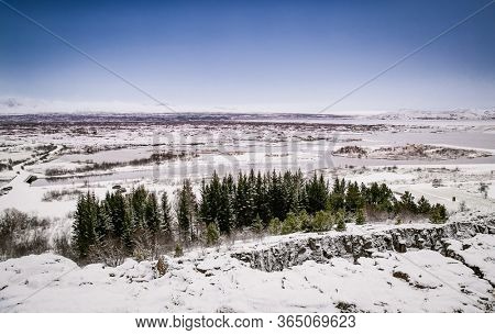 Beautiful view on Silfra rift during winter, the place where Eurasian and the American tectonic plate are divided in Thingvellir National Park, Iceland. 