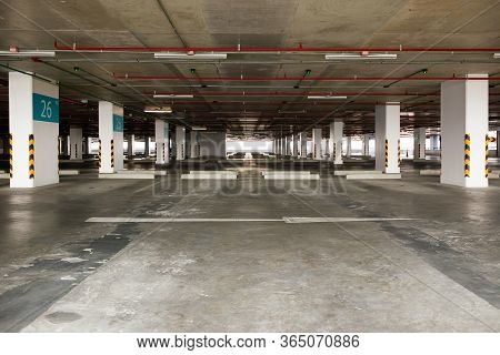 Empty Space Car Park Interior At Afternoon.indoor Parking Lot.interior Of Parking Garage With Car An