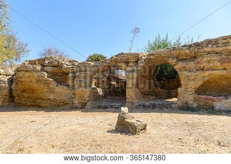 Ancient City Wall With Arcosol Tombs In The Valley Of The Temples In Agrigento, Sicily, Italy