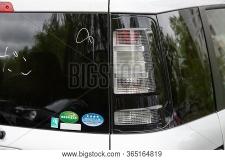 Novosibirsk/ Russia - May 02 2020: Toyota Sienta, Modern Silver Car Xenon Lamp Taillight. Detail Lig