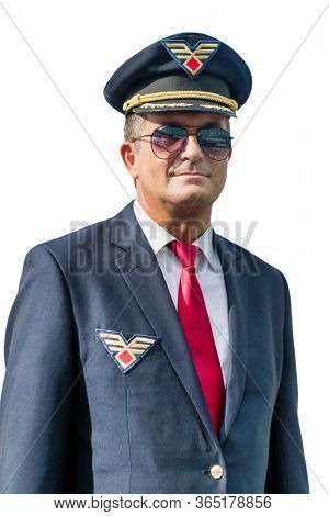 Cutouts of mature pilot standing with eyeglasses