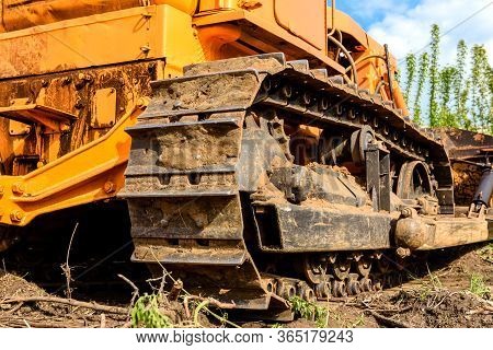 Industrial Building Construction Site Bulldozer Leveling And Moving Soil During Highway Building. Ye