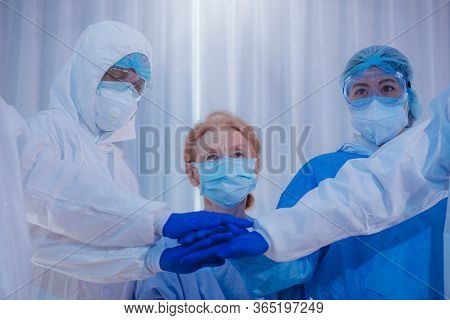 Old Woman Patient Hold Mini Heart On A Wheelchair With Background Of The Medical Team Thumbs Up Afte