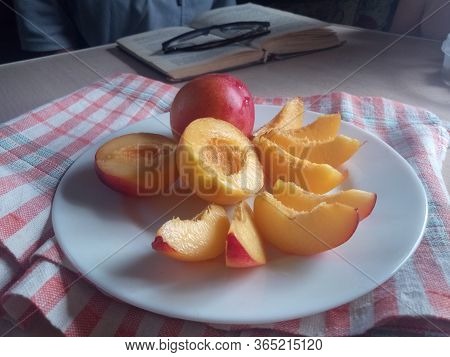 Pieces Of Nectarine On A Home Table