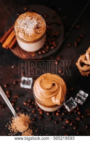 Whipped Creamy Corean Dalgona Coffee With Almond Milk And Coffee Beans. Still Life Of Delicious Morn