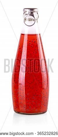 The Red Drinks With Basil Seeds Or Falooda Seeds Or Tukmaria In Bottles On White Background