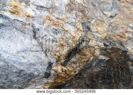 Gold Ore Texture Close-up. Contains Quartz, Mica, Feldspar, Chlorite, Garnet, Carbonate, Sulfides An