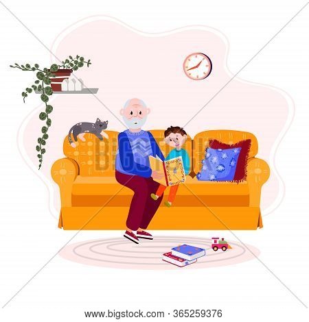 Grandfather Is Reading Book Grandson. Old Man With Boy Is Sitting On Cozy Sofa And Read Story. Happy