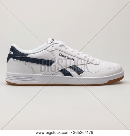 Vienna, Austria - June 14, 2018: Reebok Royal Techque White And Navy Blue Sneaker On White Backgroun