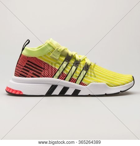 Vienna, Austria - June 14, 2018: Adidas Eqt Support Mid Advanced Pk Yellow, Red And Black Sneaker On