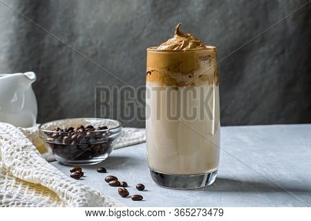 Dalgon Coffee Is A Trendy Drink From Korea. Milk And Juicy Whipped Foam Of Coffee With Sugar In A Gl