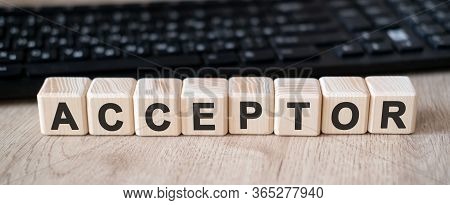 Acceptor - Concept Text On Wooden Cubes And In The Background Black Keyboard