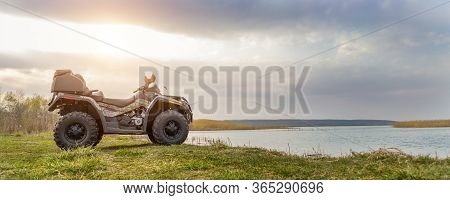 Atv Awd Quadbike Motorcycle Pov View Near Lake Or River Pond Coast With Beautiful Nature Landscape A