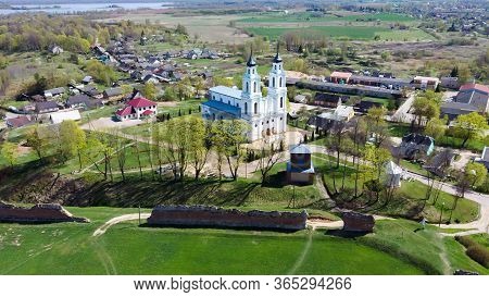 Aerial View Of The Ludza Medieval Castle Ruins On A Hill Between Big Ludza Lake And Small Ludza Lake