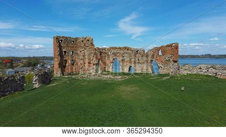 Aerial View Of The Ludza Medieval Castle Ruins On A Hill Between Big Ludza Lake And Small Ludza Lake