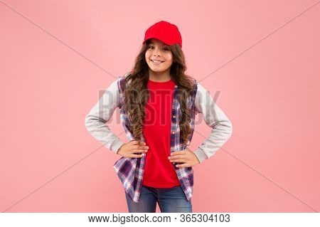 Open Minded Kid. How You Doing. Child Smiling Face. Schoolgirl Wear Cap. Teen Girl In Casual Style. 