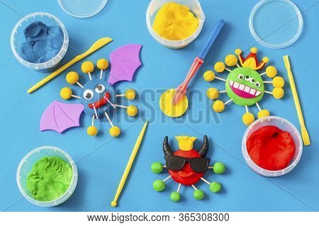 Child Makes Scary Coronaviruses From Modeling Dough. Modeling From Clay Or Dough, Children's Craft D