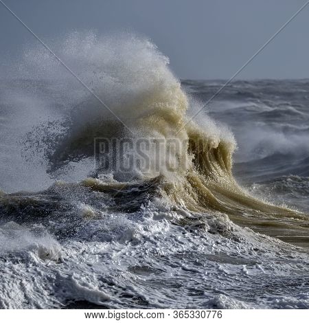 Stunning Image Of Individual Wave Breaking And Cresting During Violent Windy Storm With Superb Wave 