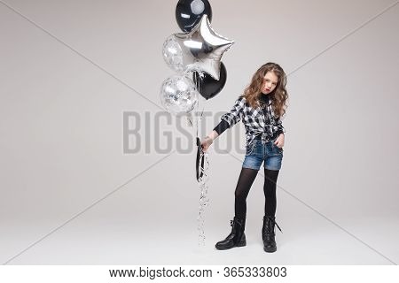 Cool Pre-teen Girl With Rock Sign. She Is Showing Rock N Roll Or Horn Sign, Gesturing At Camera And 