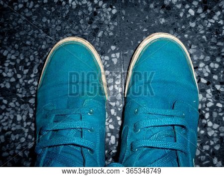 Top Angle View Of Sneaker Photograph On The Floor