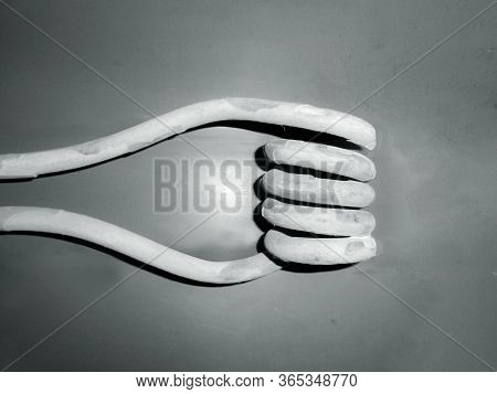 Close-up Of Electric Spiral Water Heater On Ground