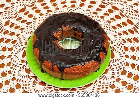 Delicious And Healthy Traditional Brazilian Homemade Carrot Cake With Chocolate Sauce. Top View. Bac