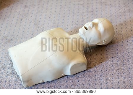 Cpr Training Using And An Aed And Bag Mask Valve On An Adult Training Manikin.  First Aid Cardiopulm