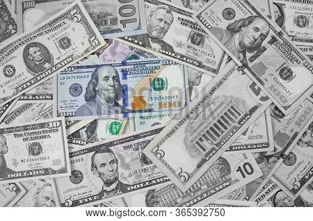 Money American Hundred Dollar Bills Pile Of Various Currencies Isolated On White Background. Closeup