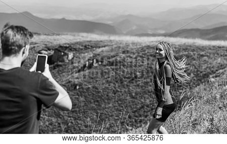 Young Adventurers. Couple Taking Photo. Couple In Love Hiking Mountains. Lets Take Photo. Capturing 