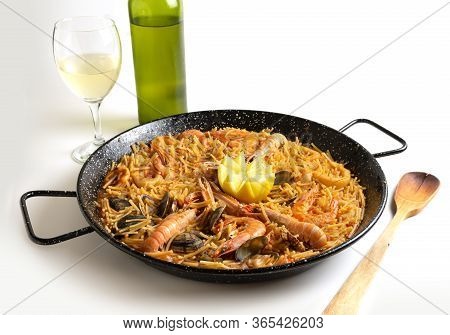 Seafood Fideua On White Background Traditional Food, Handmade, Spanish Gastronomy