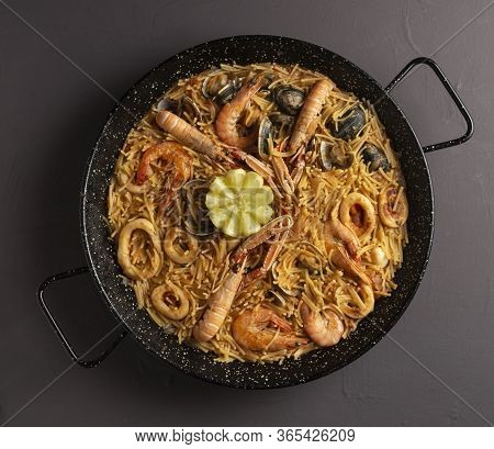Seafood Fideua Black Background Traditional Food, Spanish Gastronomy, Top View