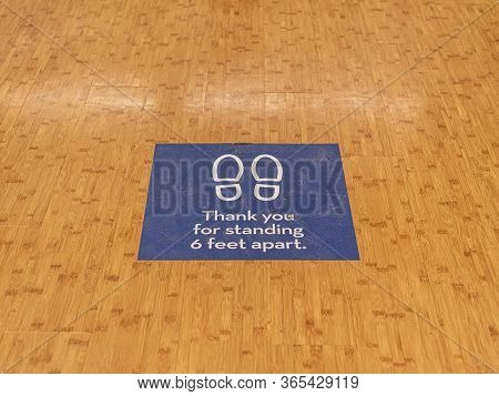 Davis, California, Usa. May 2, 2020. Sign Marking Six Feet Social Distance At The Rite Aid Store Dur