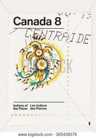 Seattle Washington - May 8, 2020: Close Up Of 1972 Canadian Stamp Featuring Native American In Tradi