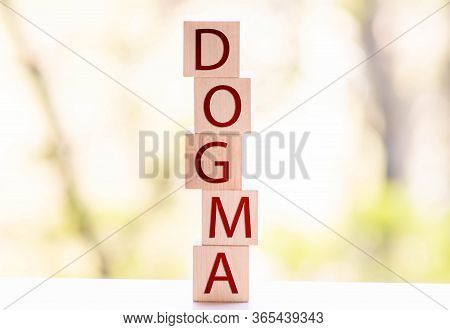 Text Of Dogma On Cubes, Business Concept