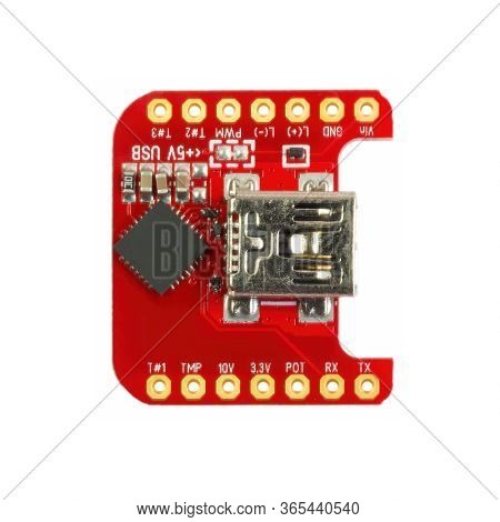 Red Universal Usb To Ttl Pcb Board Surface Mount Components In A Close-up Top View