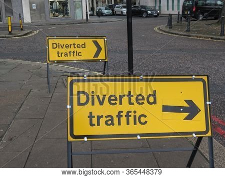 London, Uk - Circa November 2019: Regulatory Signs, Diverted Traffic, Proceed In Direction Indicated