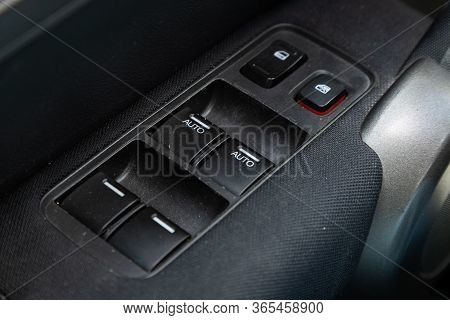 Novosibirsk/ Russia - May 02 2020: Honda Cr-v, Close-up Of The Side Door Buttons: Window Adjustment 
