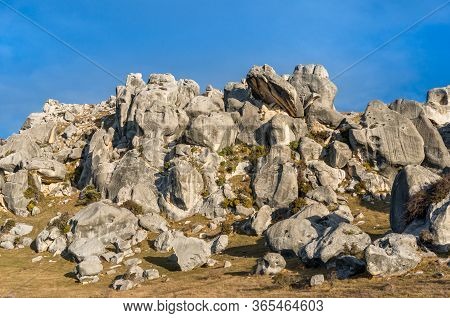 Huge Limestone Boulders, Megalith Rock Formations In Kura Tawhiti Conservation Area In New Zealand