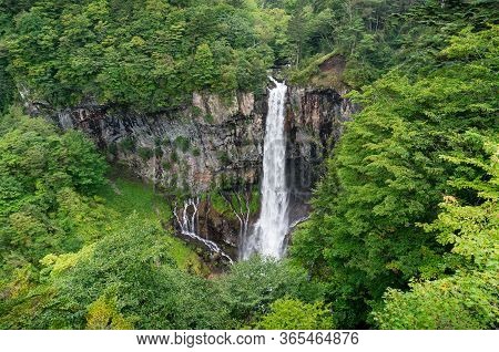 Waterfall In The Green Summer Forest Landscape. Kegon Falls In Nikko, Japan