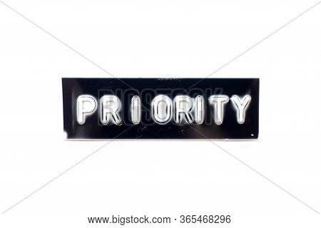 Embossed Letter In Word Priority In Black Banner On White Background