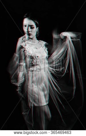 Crazy Portrait Of A Girl With Mental Disorders And Schizophrenic Diseases With Blur