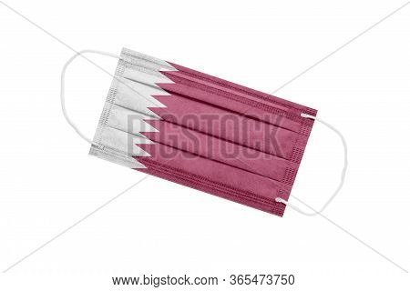Medical Mask With Flag Of Qatar Isolated On White Background. Qatar Pandemic Concept. Attribute Of A