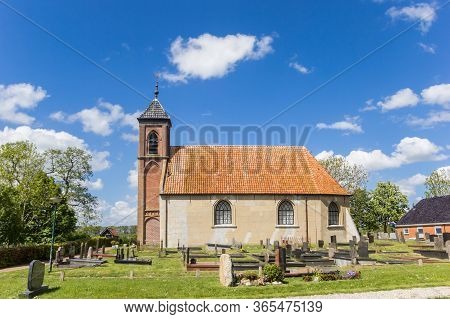 DORKWERD, NETHERLANDS - MAY 5, 2020: Historic church in the small village of Dorkwerd, Netherlands