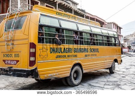 Jomsom, Nepal - November 19, 2015: Children Riding A School Bus To School In The Early Morning In Jo