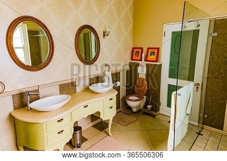 Inside Interior Of Empty Bathroom And Toilet In Up-market House In The Suburbs