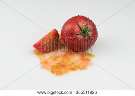 Fresh Wet Tomatoes On A White Background. Sliced Tomatoes With Pulp
